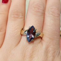 Iolite and diamond ring in 14 carat gold