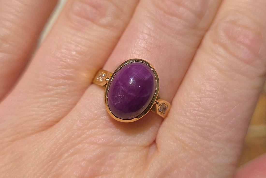 Cabochon ruby and diamond ring in 18 carat gold