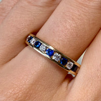 Sapphire and diamond eternity band in 18 carat gold