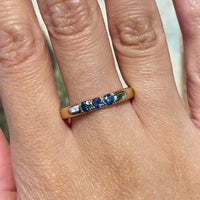 14 carat gold ring with sapphires