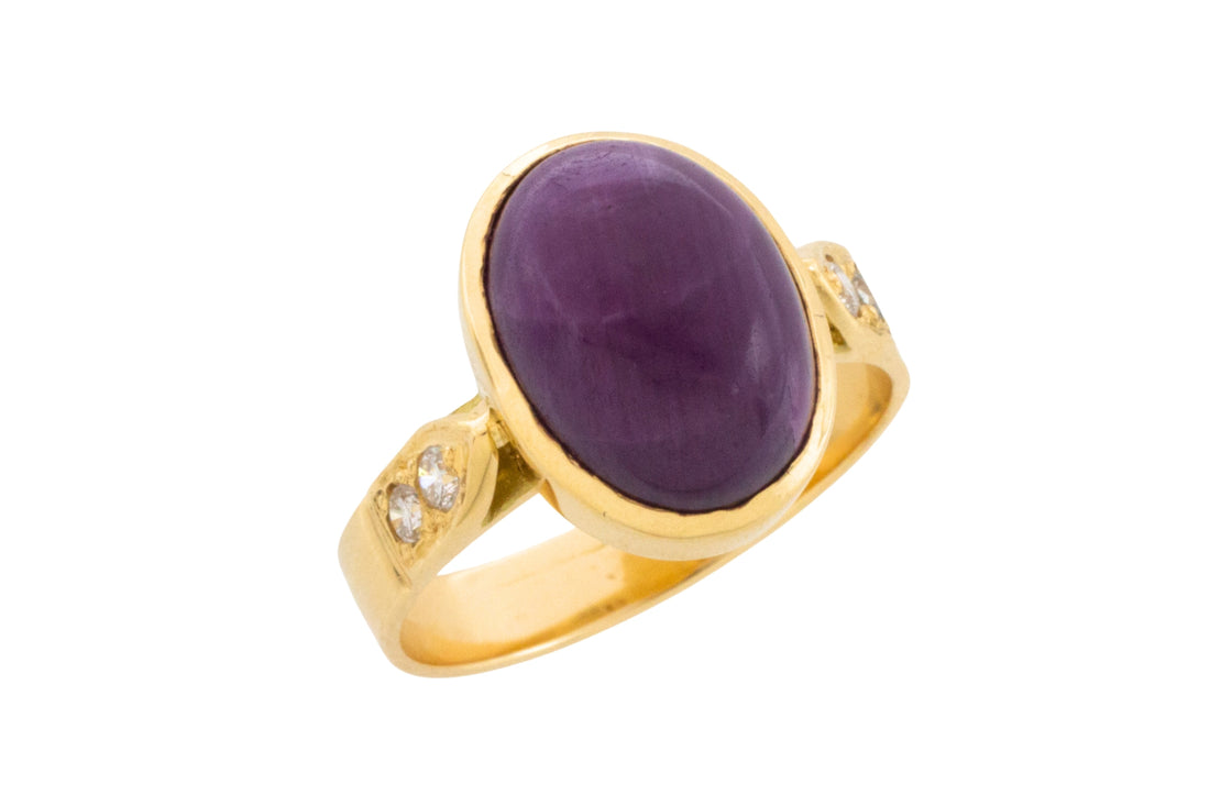 Cabochon ruby and diamond ring in 18 carat gold