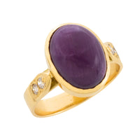 Cabochon ruby and diamond ring in 18 carat gold