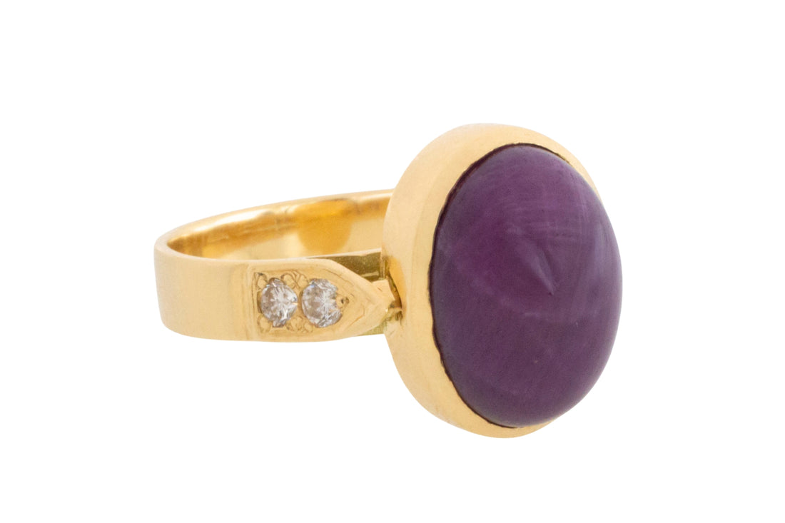 Cabochon ruby and diamond ring in 18 carat gold
