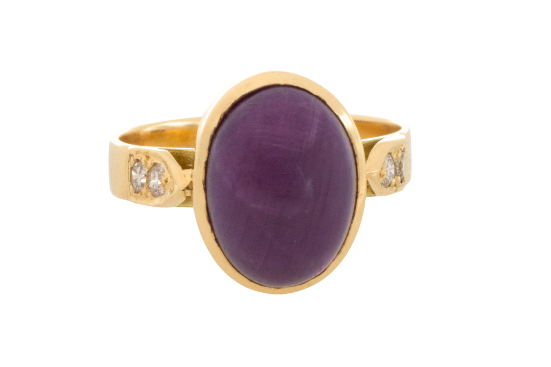 Cabochon ruby and diamond ring in 18 carat gold
