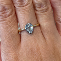 Old pear cut diamond solitaire ring