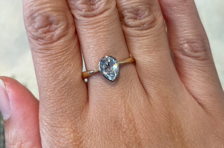 Old pear cut diamond solitaire ring