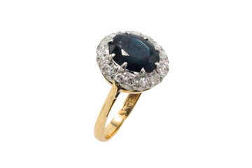 Vintage sapphire and diamond cluster ring