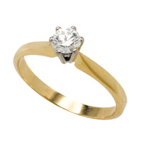 Diamond solitaire ring in 14 carat gold
