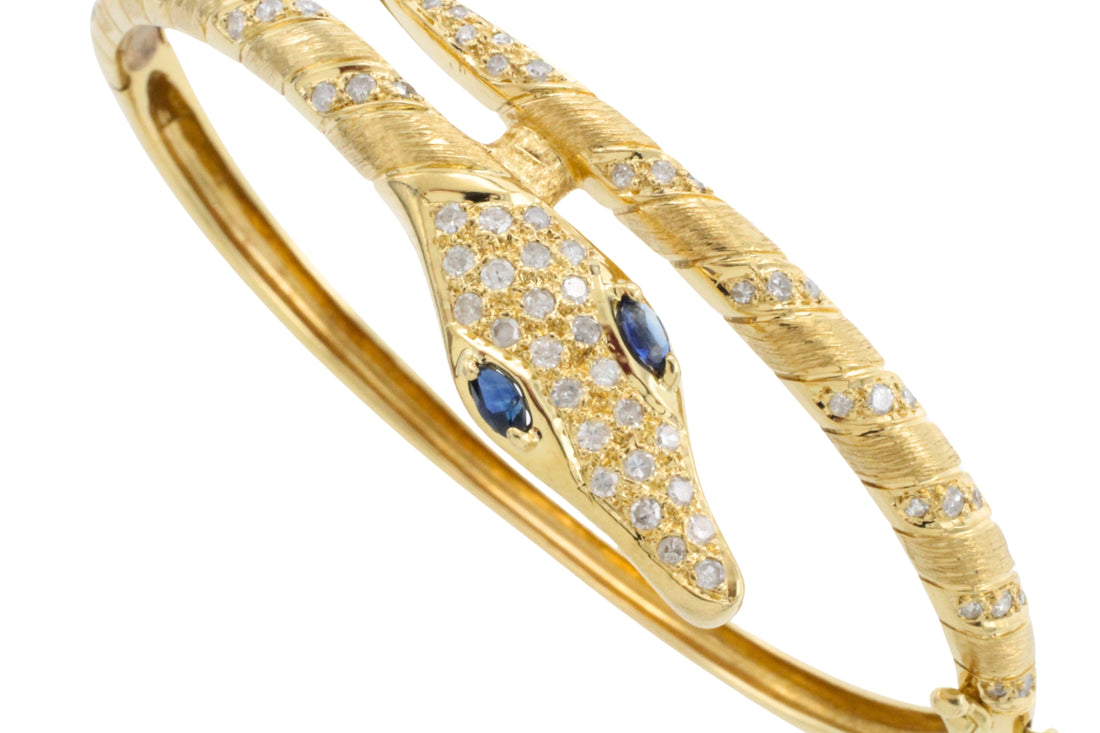 18 carat snake bracelet with diamonds and sapphires