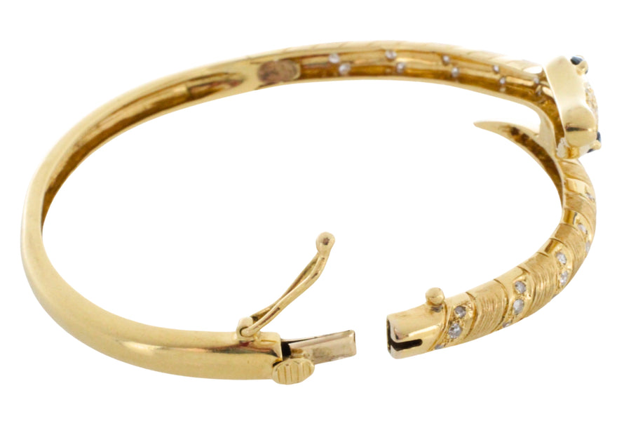 18 carat snake bracelet with diamonds and sapphires