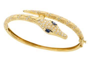 18 carat snake bracelet with diamonds and sapphires