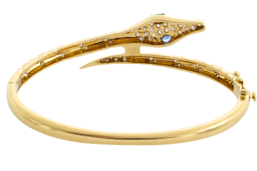18 carat snake bracelet with diamonds and sapphires