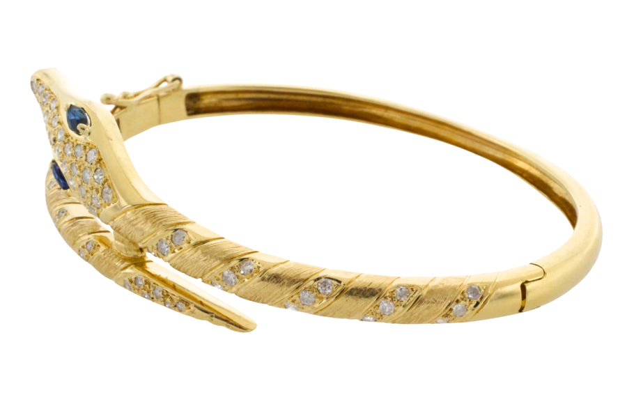18 carat snake bracelet with diamonds and sapphires
