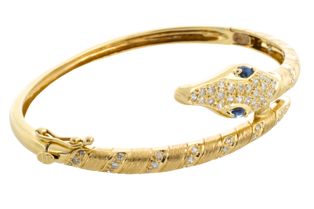 18 carat snake bracelet with diamonds and sapphires