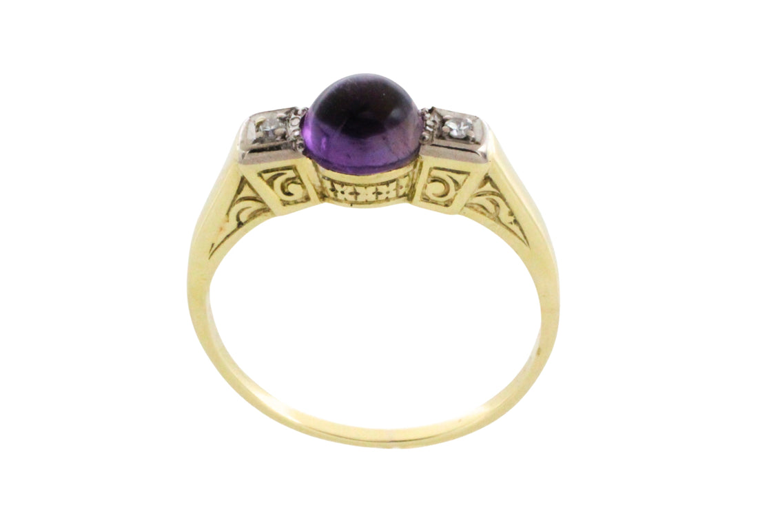 Cabochon amethyst ring with diamonds