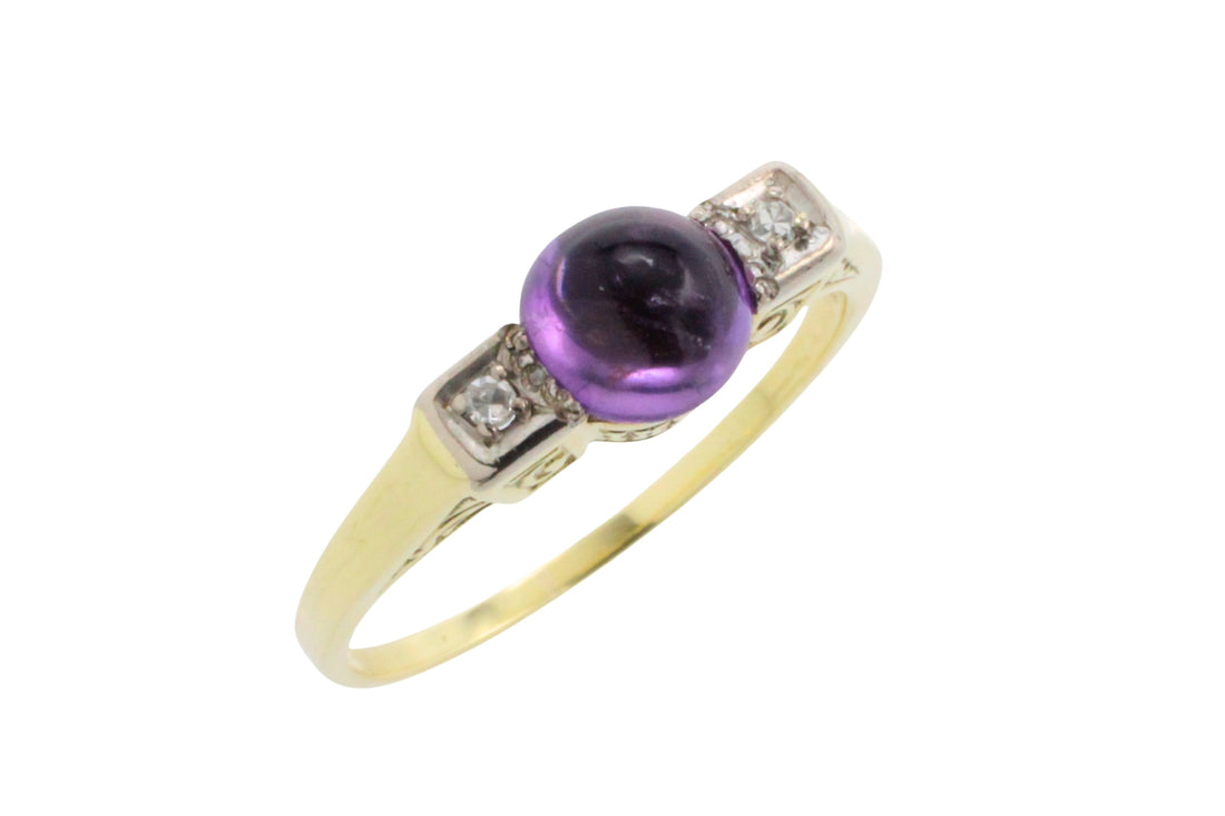 Cabochon amethyst ring with diamonds