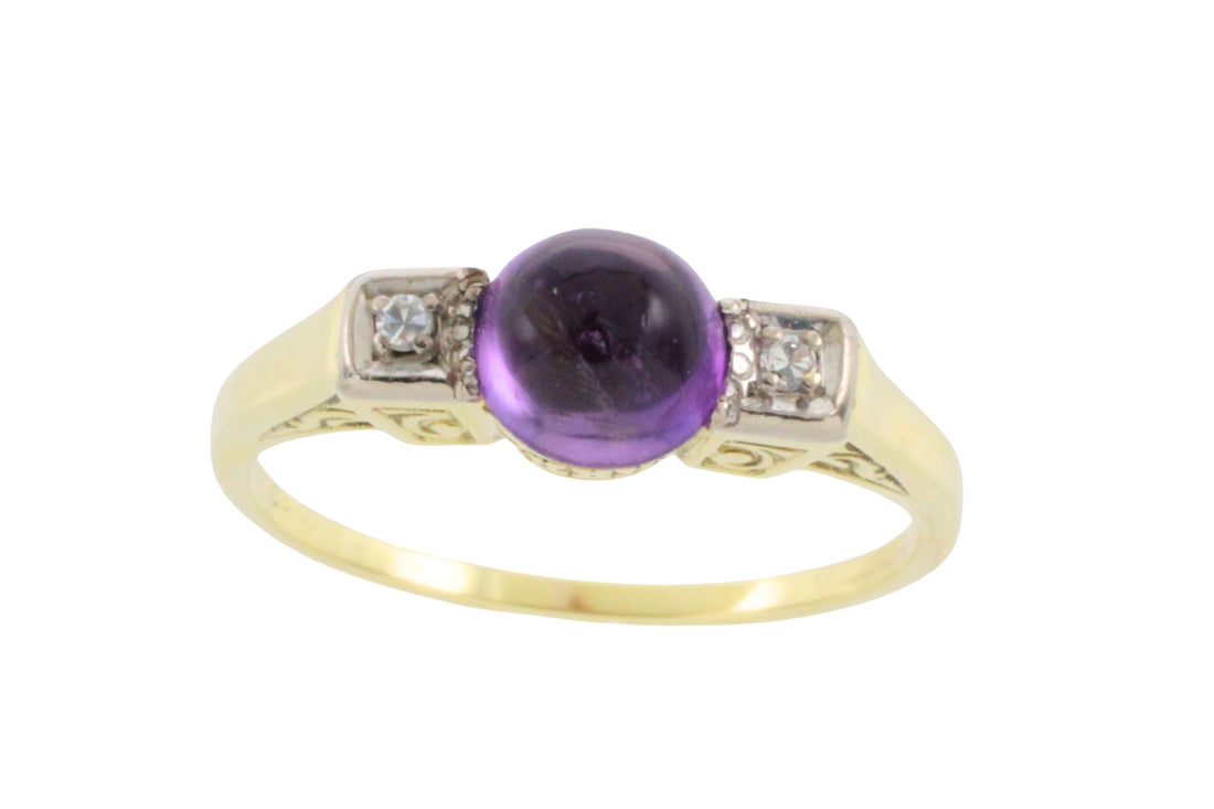 Cabochon amethyst ring with diamonds