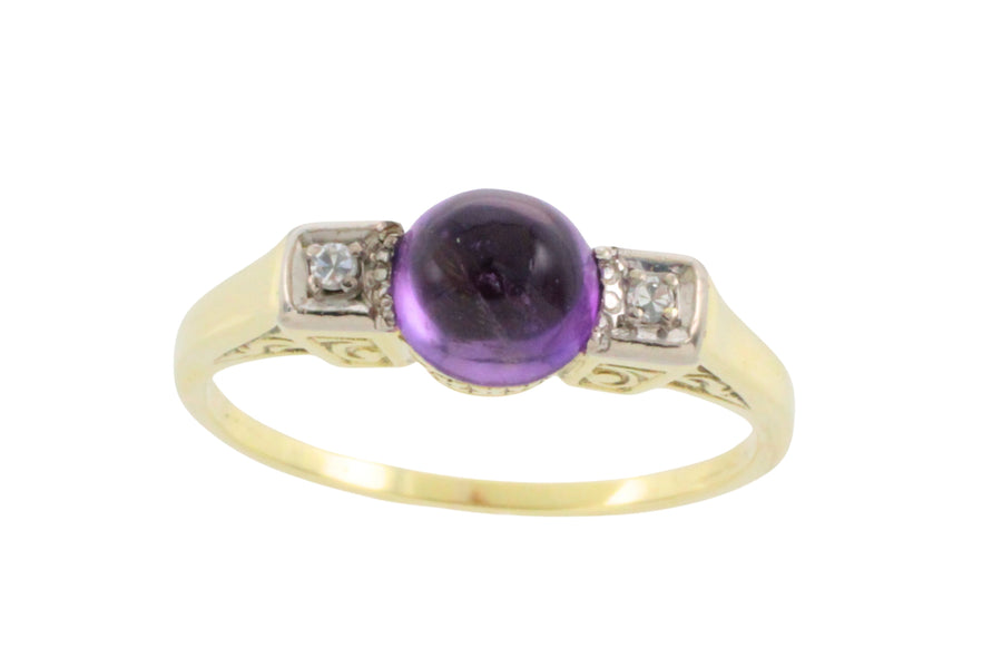 Cabochon amethyst ring with diamonds