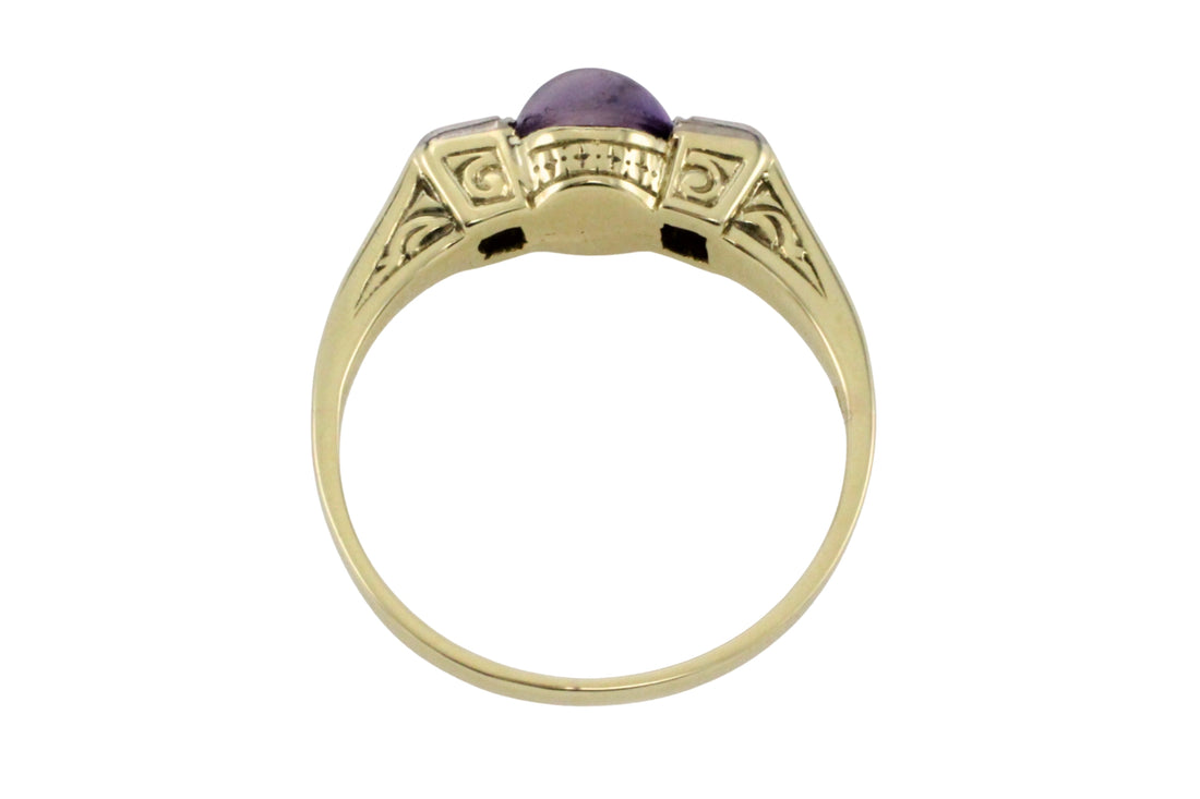 Cabochon amethyst ring with diamonds