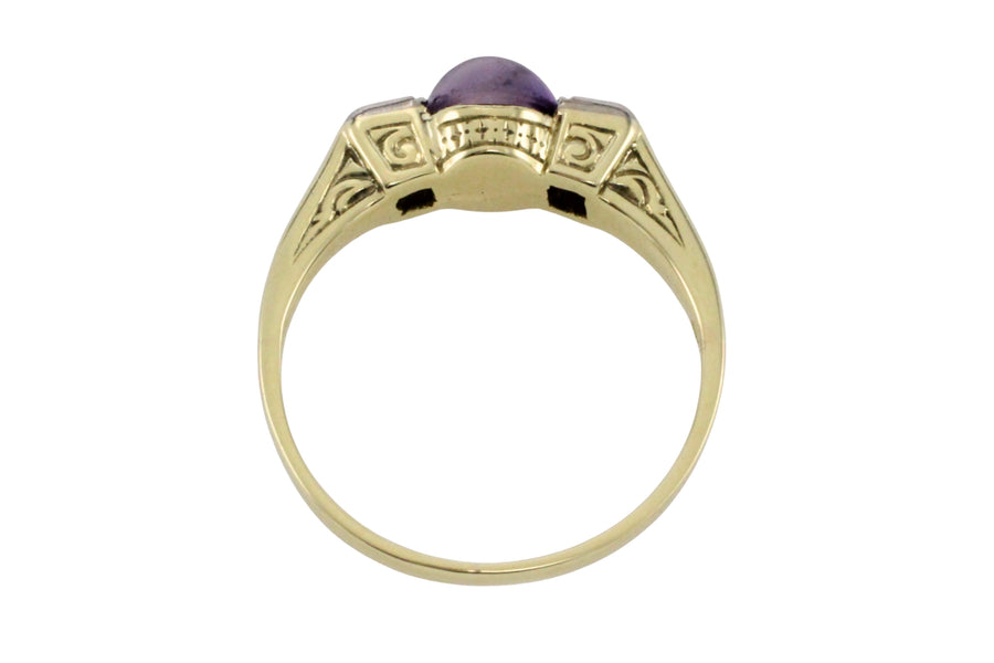 Cabochon amethyst ring with diamonds