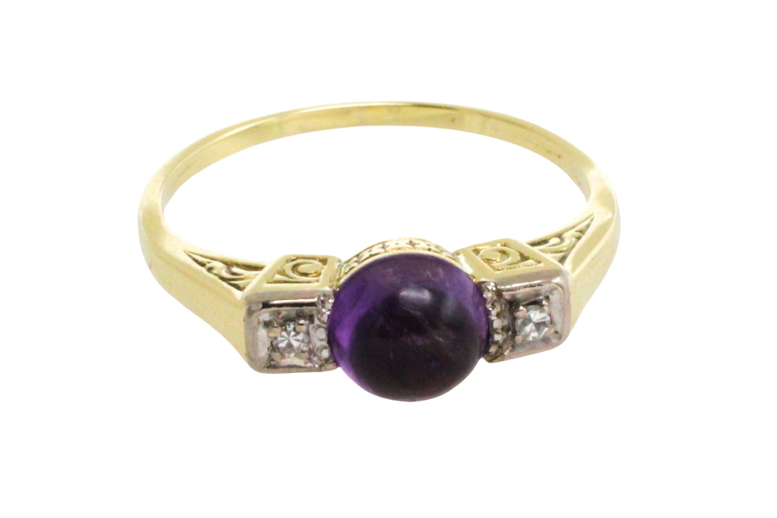 Cabochon amethyst ring with diamonds