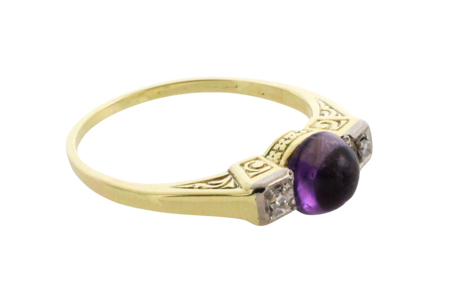 Cabochon amethyst ring with diamonds