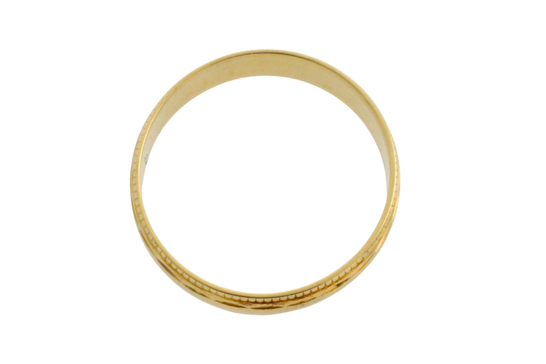 Vintage 18 carat gold band with motif