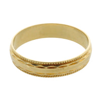 Vintage 18 carat gold band with motif