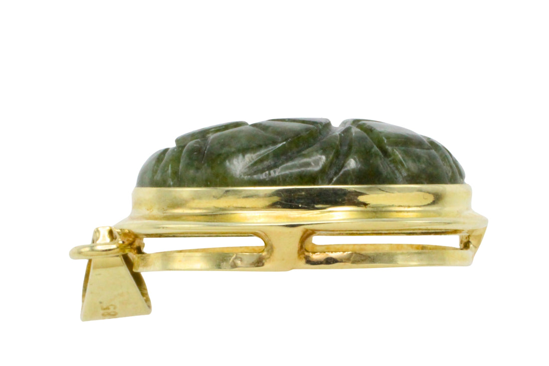 Neferite jade pendant in 14 carat gold