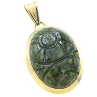 Neferite jade pendant in 14 carat gold