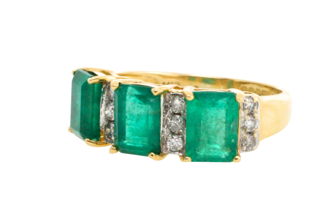 Emerald and diamond ring in 18 carat gold