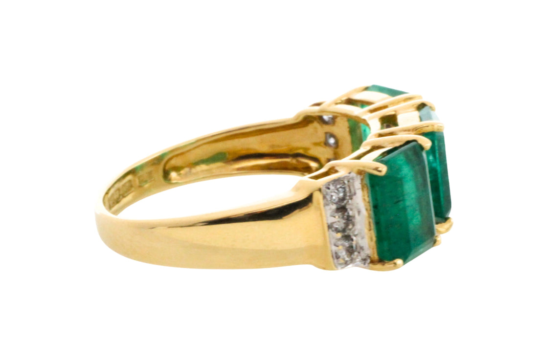 Emerald and diamond ring in 18 carat gold