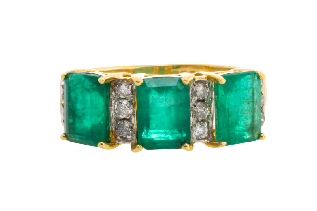 Emerald and diamond ring in 18 carat gold