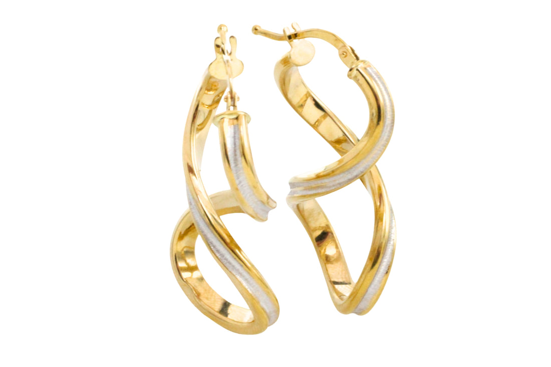 Spiral earrings in yellow and white gold