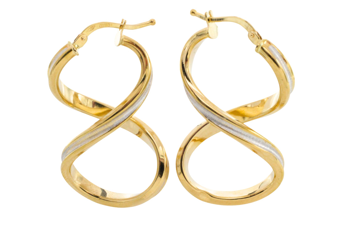 Spiral earrings in yellow and white gold