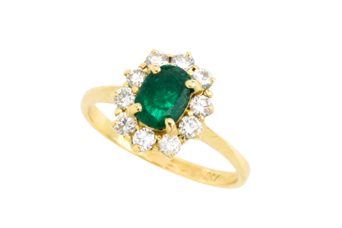 Vintage emerald and diamond ring in 18 carat gold