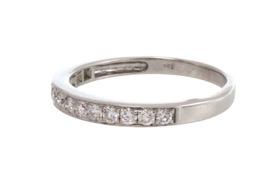18 carat white gold band with diamonds