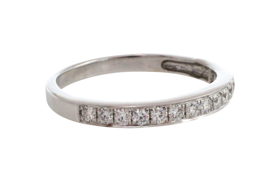 18 carat white gold band with diamonds