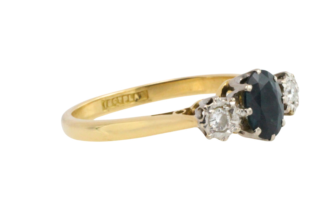 Vintage three stone sapphire and diamond ring