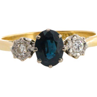 Vintage three stone sapphire and diamond ring