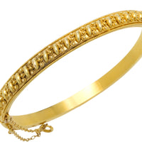 Vintage hinged bracelet in 14 carat gold
