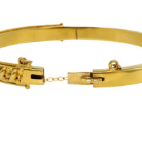 Vintage hinged bracelet in 14 carat gold