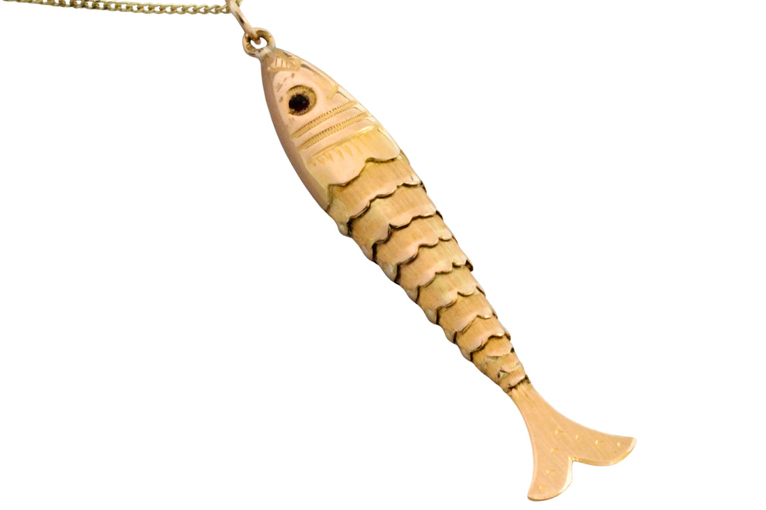 Vintage 14 carat gold fish pendant