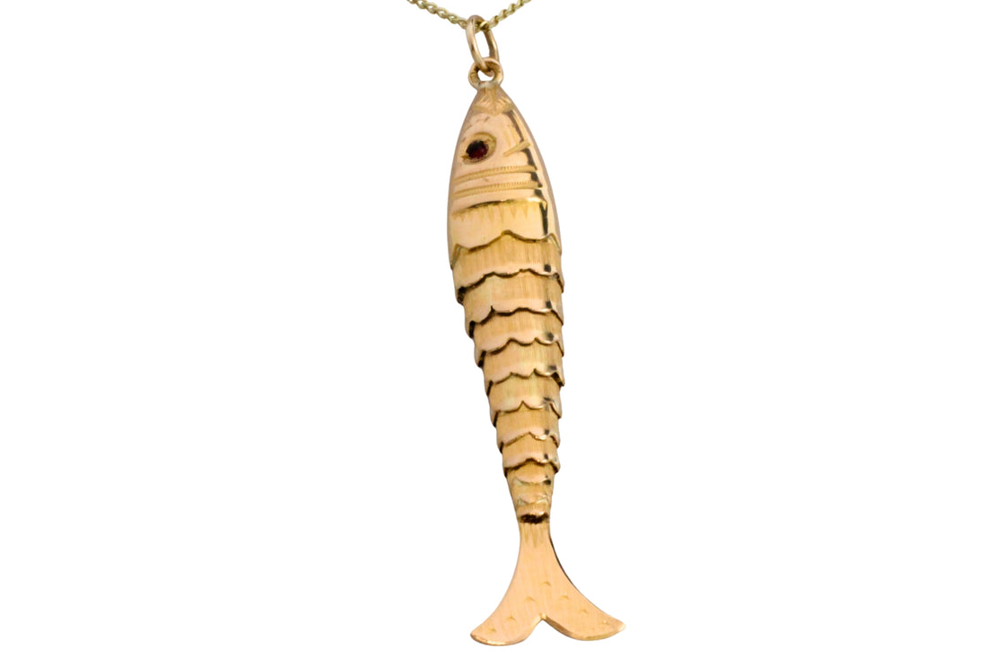 Vintage 14 carat gold fish pendant