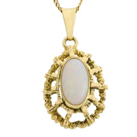 Cabochon opal pendant in 14 carat gold