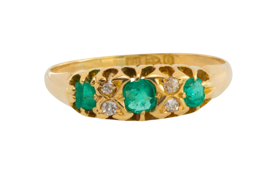 Victorian emerald and diamond ring from 1897