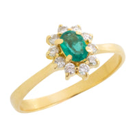 Emerald and diamond cluster ring in 18 carat gold