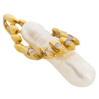 Baroque pearl and diamond pendant in 14 carat gold