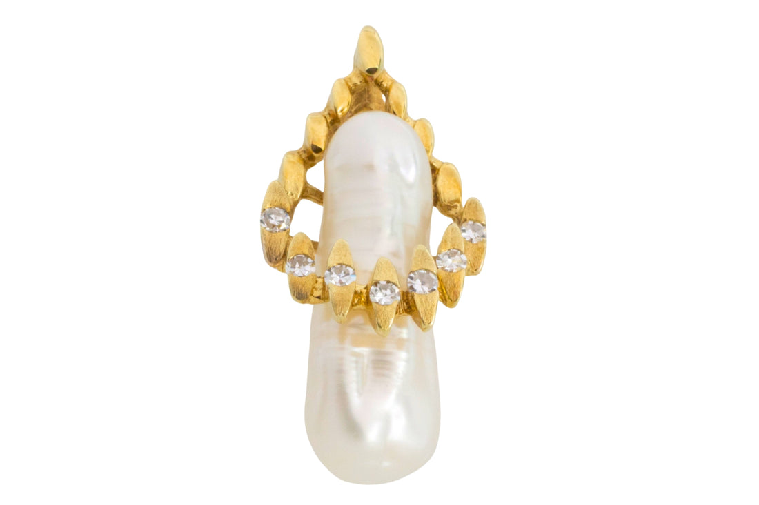 Baroque pearl and diamond pendant in 14 carat gold