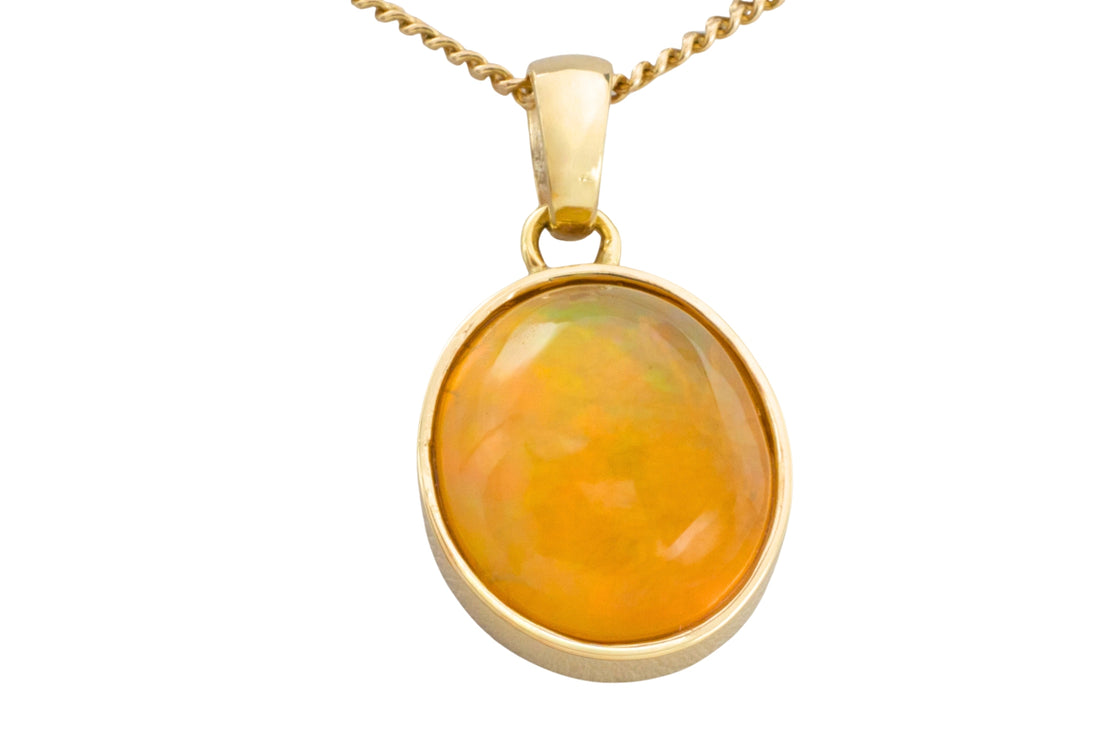 Orange opal pendant in 14 carat gold